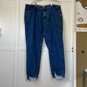 Straight leg jean with distressed ankles